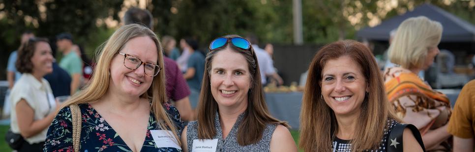 Bethany Wolf, Jamie Shattuck, Julie Hirsch gather at the social hour