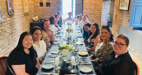 MBA students in Chile, seated at a dining table