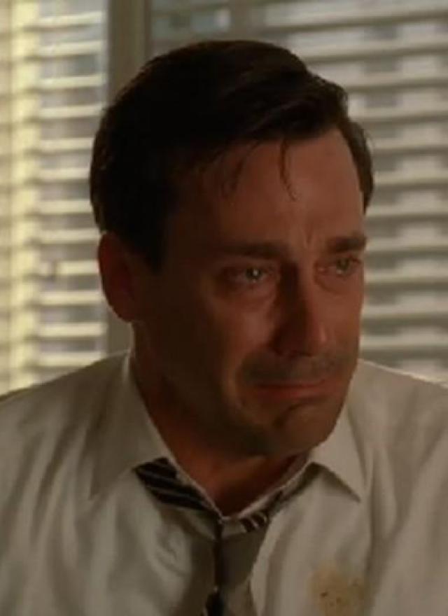 Jon Hamm crying in an office