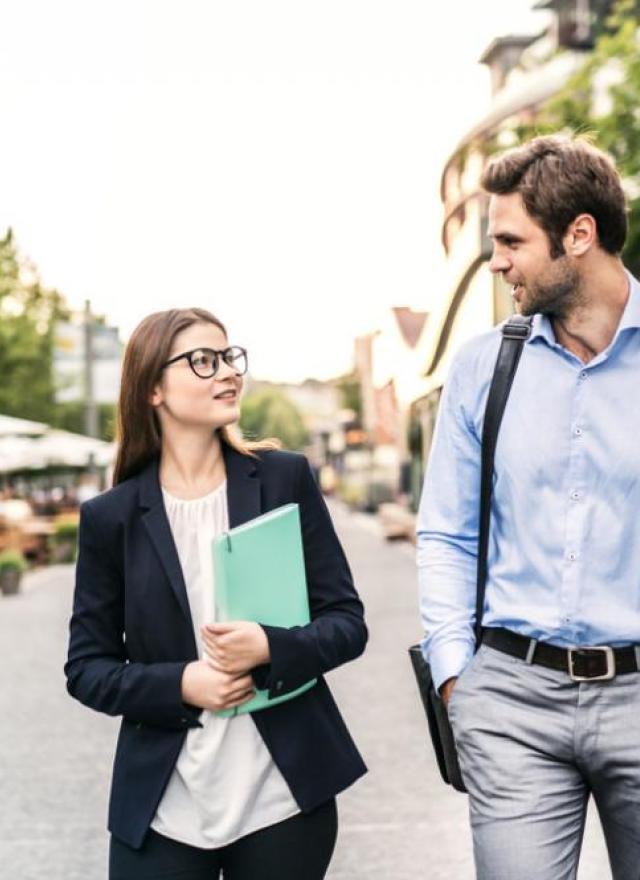 Two people on a walking meeting