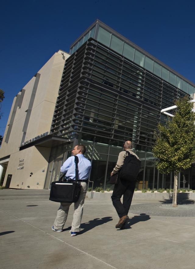 People walking in front of Gallagher Hall