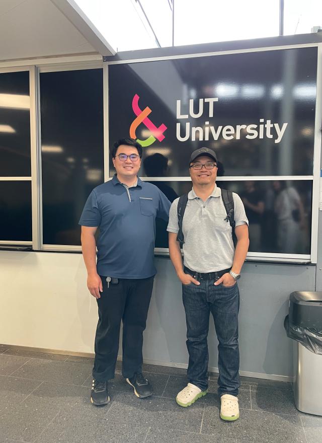 People in front of LUT University sign