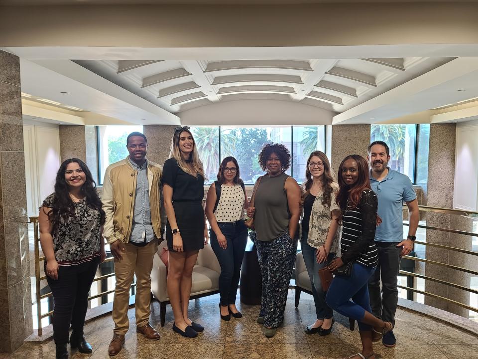 Esther and her cohort on a tour of new proposed building