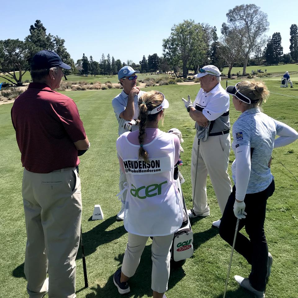 Kevin Heaney with golfers