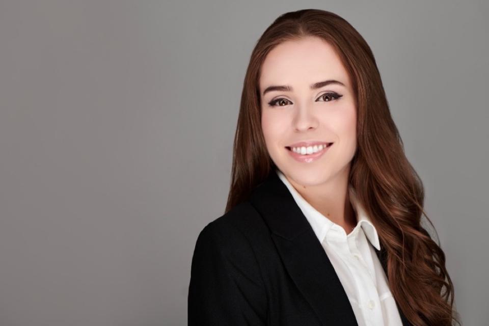 Woman smiling in professional attire